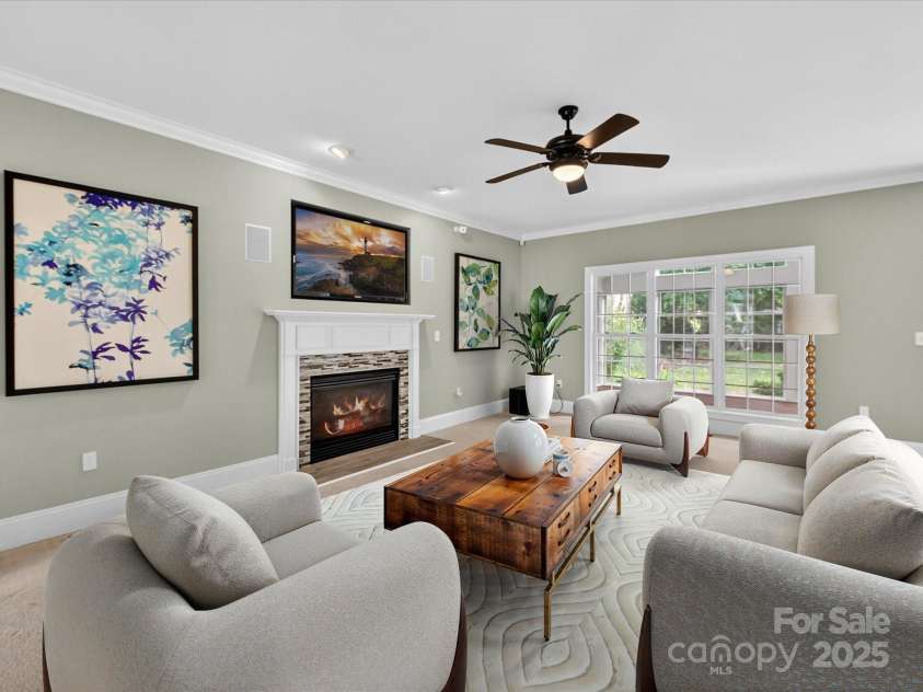 10007 Devereaux Drive, Matthews, NC 28105.  MLS# CAR4307264, YatesRealty ID 40812. Great room virtually staged