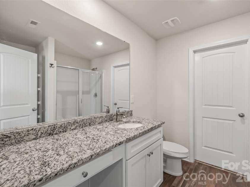 1232 Phifer Road, Kings Mountain, NC 28086.  MLS# CAR4361714, YatesRealty ID 40812. Primary Bath vanity with makeup area with seating