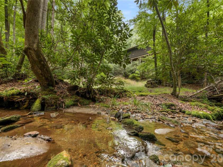 911 Buckberry Drive, Sapphire, NC 28774.  MLS# CAR4405145, YatesRealty ID 40813. 