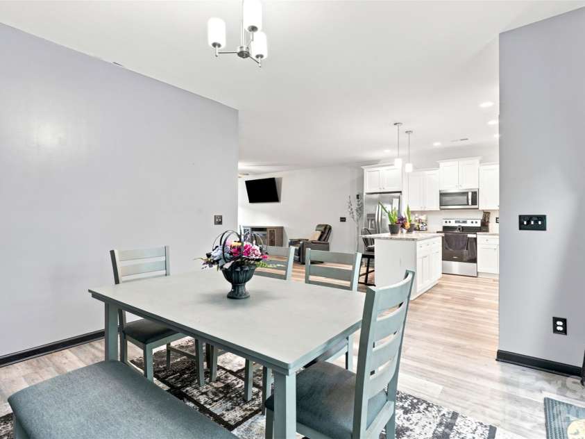 313 Bell Street, Mount Holly, NC 28120.  MLS# CAR4407758, YatesRealty ID 40814. Diningroom open to kitchen