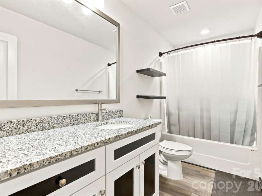 313 Bell Street, Mount Holly, NC 28120.  MLS# CAR4407758, YatesRealty ID 40814. Guest bath