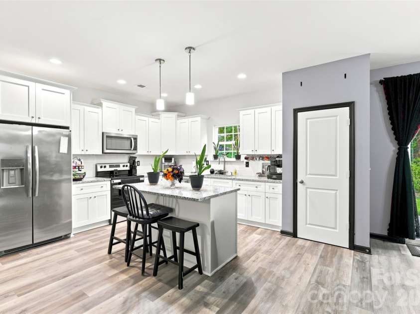 313 Bell Street, Mount Holly, NC 28120.  MLS# CAR4407758, YatesRealty ID 40814. Kitchen w/ pantry