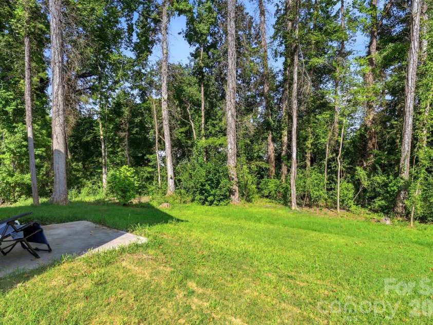 313 Bell Street, Mount Holly, NC 28120.  MLS# CAR4407758, YatesRealty ID 40814. Large back yard