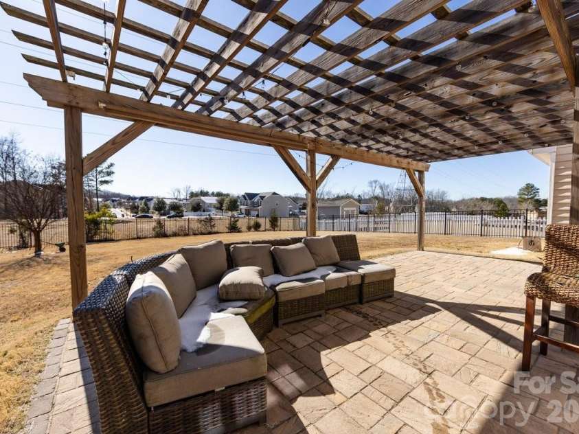 8931 Happiness Road, Harrisburg, NC 28075.  MLS# CAR4331689, YatesRealty ID 40820. Custom Patio