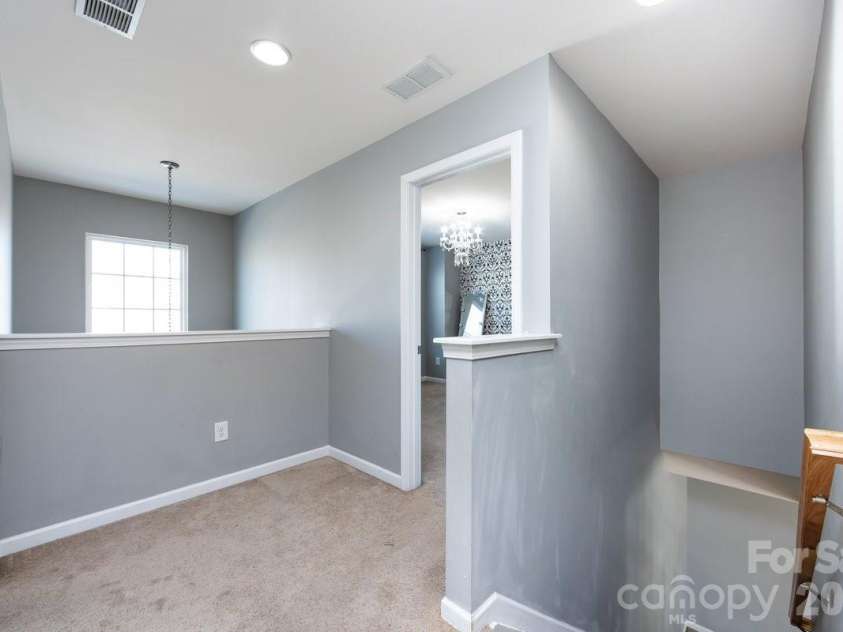 8931 Happiness Road, Harrisburg, NC 28075.  MLS# CAR4331689, YatesRealty ID 40820. Upstairs Landing