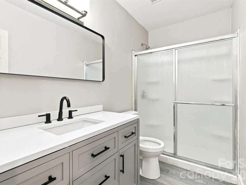6707 Providence Road, Waxhaw, NC 28173.  MLS# CAR4408651, YatesRealty ID 40831. Unpermitted Garage Full Bathroom main level