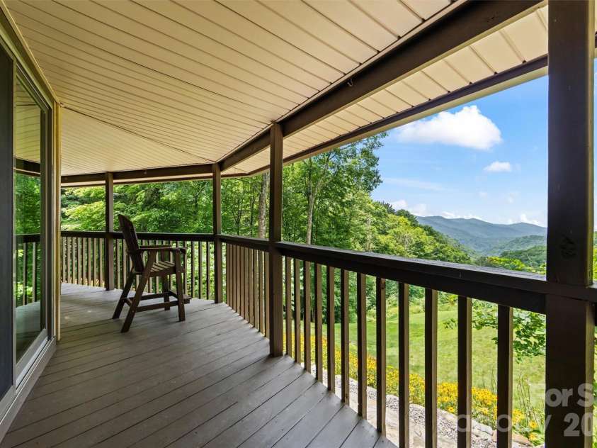 670 Parkway Drive, Maggie Valley, NC 28751.  MLS# CAR4405565, YatesRealty ID 40834. Never too many decks with that view