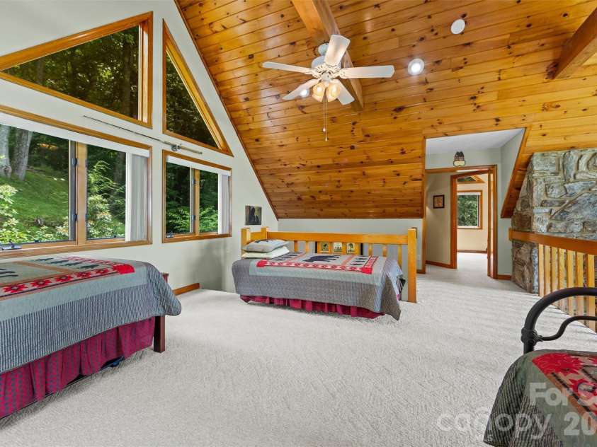 670 Parkway Drive, Maggie Valley, NC 28751.  MLS# CAR4405565, YatesRealty ID 40834. Sit a spell