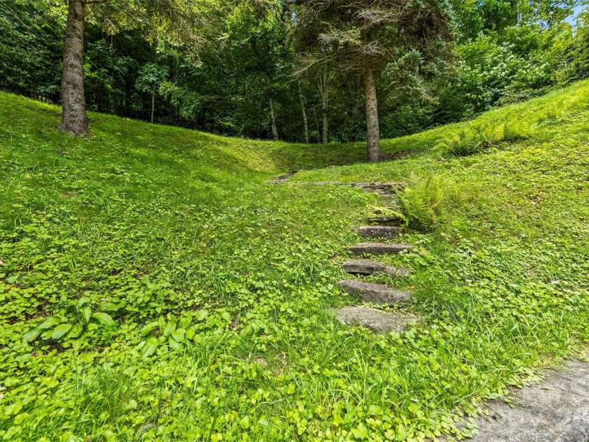 670 Parkway Drive, Maggie Valley, NC 28751.  MLS# CAR4405565, YatesRealty ID 40834. Utility buildingon upper driveway
