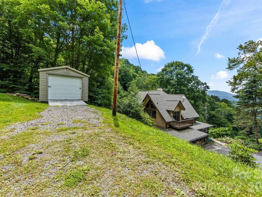 670 Parkway Drive, Maggie Valley, NC 28751.  MLS# CAR4405565, YatesRealty ID 40834. Utility buildingon upper driveway