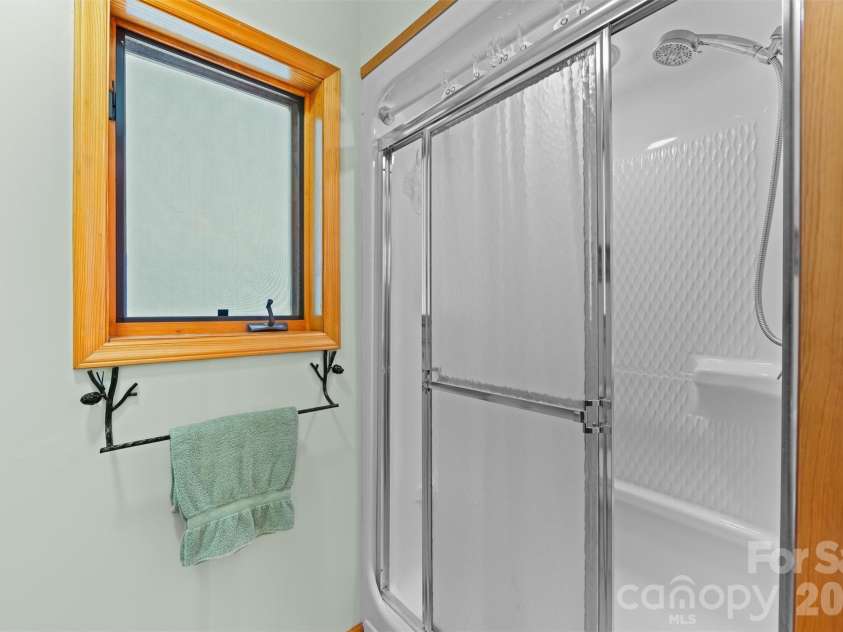 670 Parkway Drive, Maggie Valley, NC 28751.  MLS# CAR4405565, YatesRealty ID 40834. Walk in shower