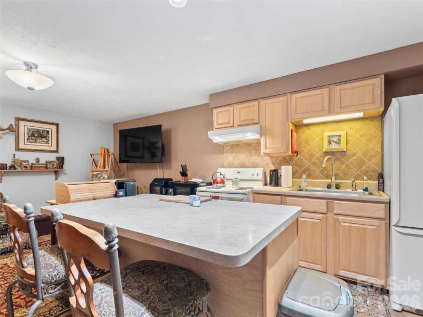 3 Westbridge Drive, Hendersonville, NC 28739.  MLS# CAR4398725, YatesRealty ID 40837. Kitchen Area in Great Room