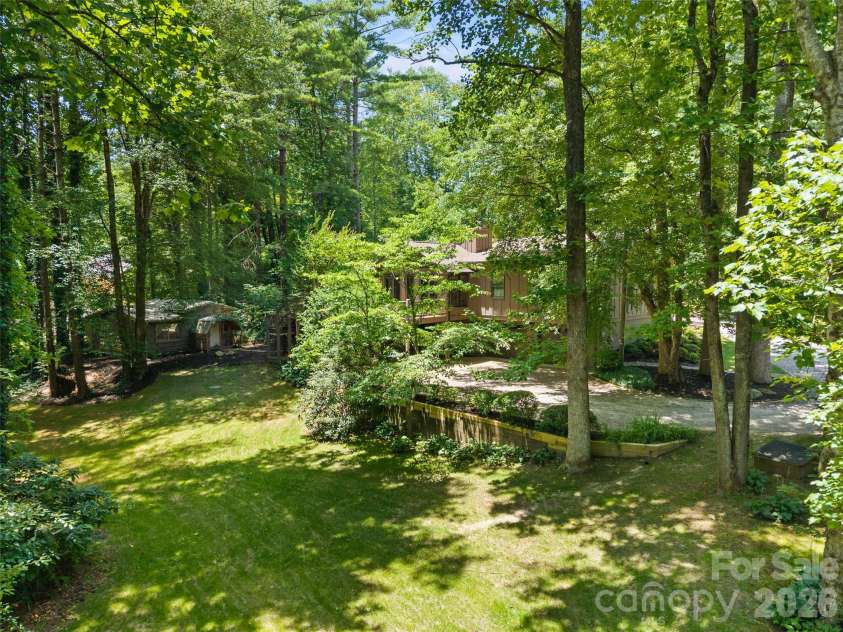 3 Westbridge Drive, Hendersonville, NC 28739.  MLS# CAR4398725, YatesRealty ID 40837. Natural Landscaping
