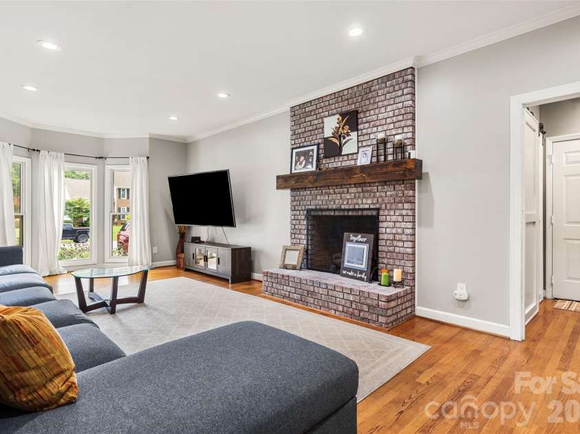 3375 Blue Jay Pass, Fort Mill, SC 29708.  MLS# CAR4401520, YatesRealty ID 40840. Cozy living room with fireplace
