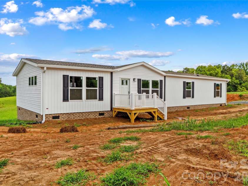532 Eagle Mills Road, Hamptonville, NC 27020.  MLS# CAR4409145, YatesRealty ID 40850. 