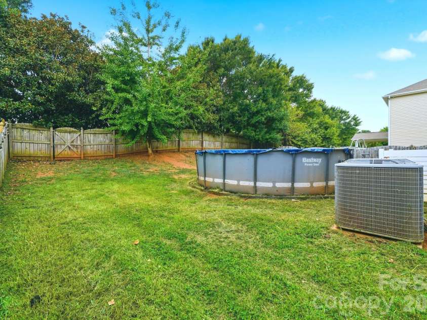 5011 Elementary View Drive, Charlotte, NC 28269.  MLS# CAR4407861, YatesRealty ID 40857. 