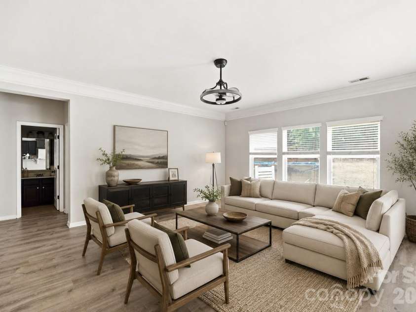 5011 Elementary View Drive, Charlotte, NC 28269.  MLS# CAR4407861, YatesRealty ID 40857. Living Room - Virtually Staged