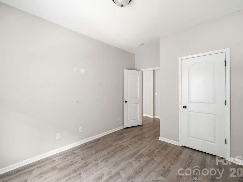 5011 Elementary View Drive, Charlotte, NC 28269.  MLS# CAR4407861, YatesRealty ID 40857. Main floor bedroom