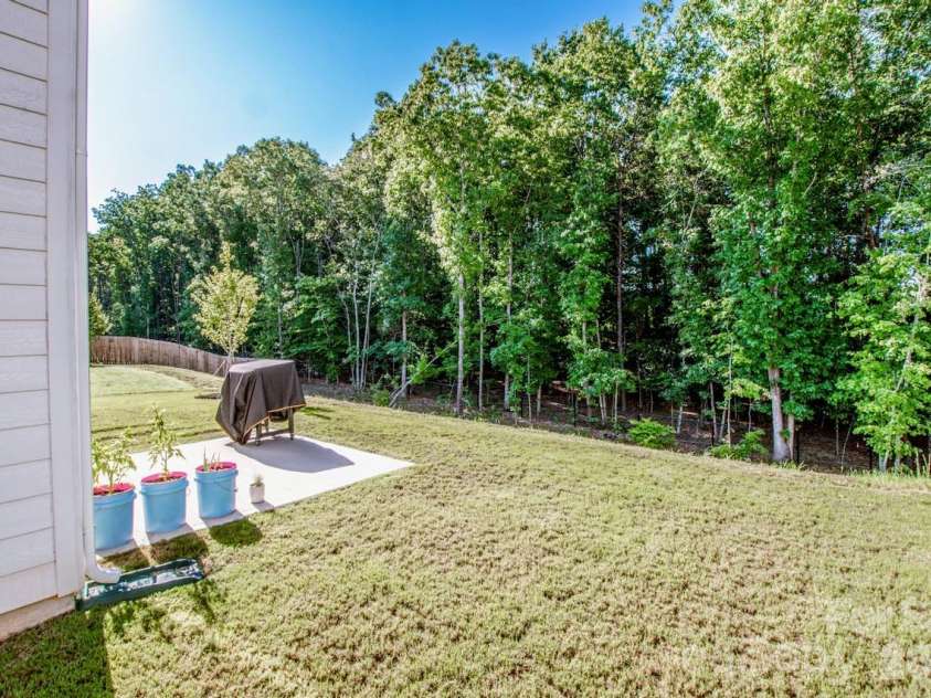 119 Brixham Loop, Troutman, NC 28166.  MLS# CAR4410222, YatesRealty ID 40876. Gorgeous Private backyard