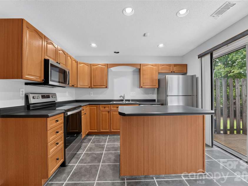 9357 Glenwater Drive, Charlotte, NC 28262.  MLS# CAR4410481, YatesRealty ID 40886. 