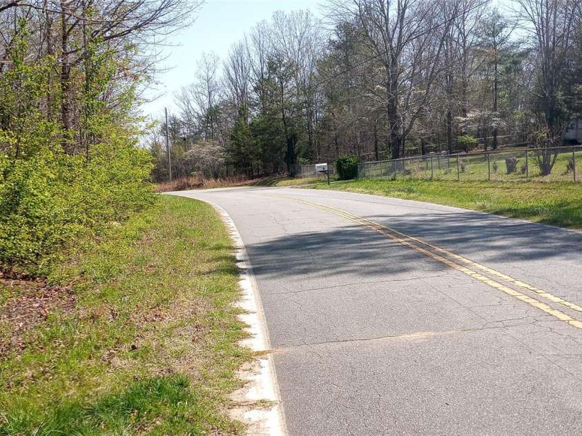 950 Biggerstaff Loop, Nebo, NC 28761.  MLS# CAR4104496, YatesRealty ID 409. Lot 6 on  right