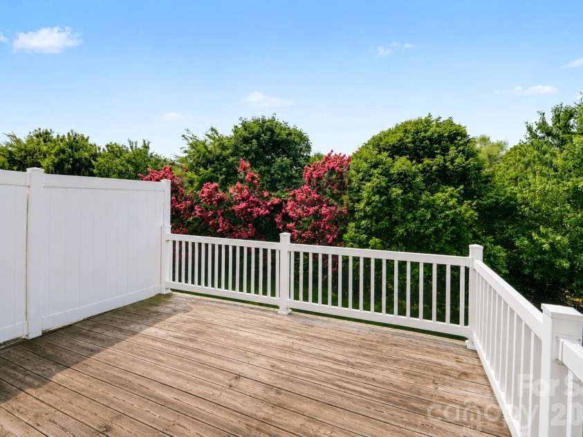 10221 Garrett Grigg Road, Charlotte, NC 28262.  MLS# CAR4405868, YatesRealty ID 40901. Deck Overlooking Backyard