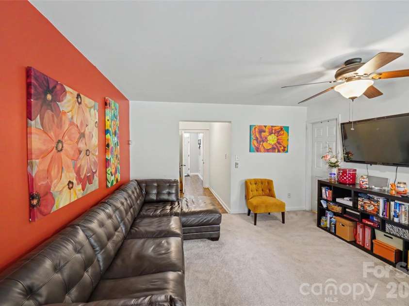 10221 Garrett Grigg Road, Charlotte, NC 28262.  MLS# CAR4405868, YatesRealty ID 40901. Lower Level Great Room