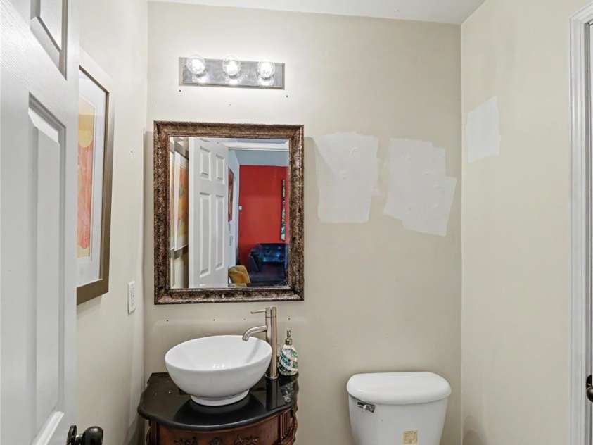 10221 Garrett Grigg Road, Charlotte, NC 28262.  MLS# CAR4405868, YatesRealty ID 40901. Lower Level Half-Bath