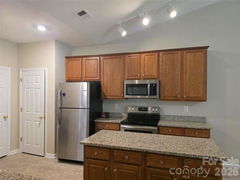 4715 Stoney Brook Lane, Harrisburg, NC 28075.  MLS# CAR4408041, YatesRealty ID 40919. Kitchen