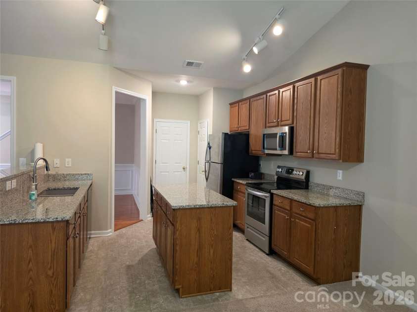 4715 Stoney Brook Lane, Harrisburg, NC 28075.  MLS# CAR4408041, YatesRealty ID 40919. Kitchen