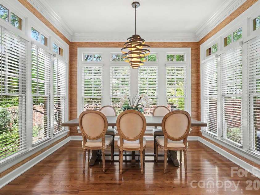 1120 Dilworth Crescent Row, Charlotte, NC 28203.  MLS# CAR4396868, YatesRealty ID 40935. Gorgeous dining space surrounded by windows