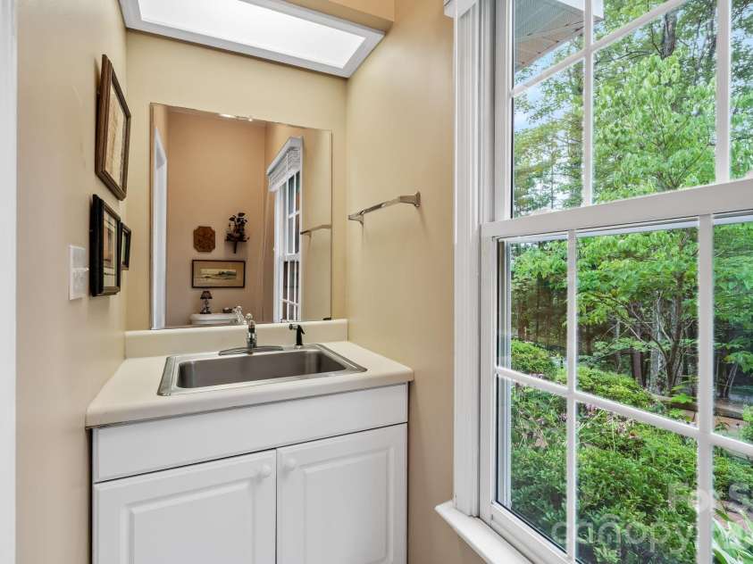 21 Four Oaks Drive, Arden, NC 28704.  MLS# CAR4407060, YatesRealty ID 40936. 