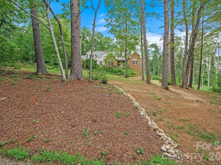 21 Four Oaks Drive, Arden, NC 28704.  MLS# CAR4407060, YatesRealty ID 40936. 