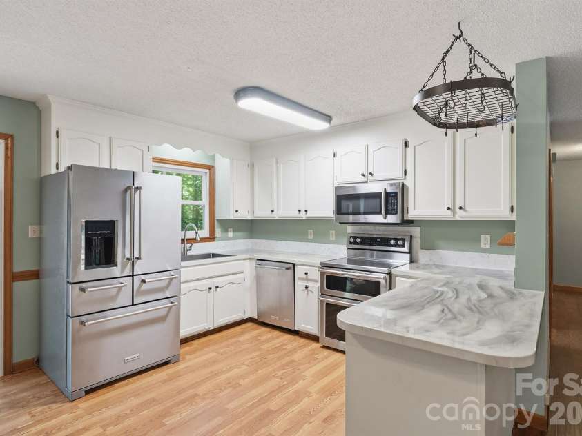 221 Shadowbrook Road, Mount Holly, NC 28120.  MLS# CAR4403082, YatesRealty ID 40947. 