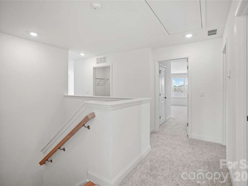1011 High Bluff Point, Waxhaw, NC 28173.  MLS# CAR4385398, YatesRealty ID 4095. Hallway Upstairs