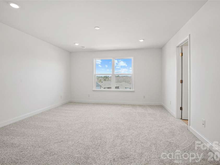 1011 High Bluff Point, Waxhaw, NC 28173.  MLS# CAR4385398, YatesRealty ID 4095. Owner's Suite