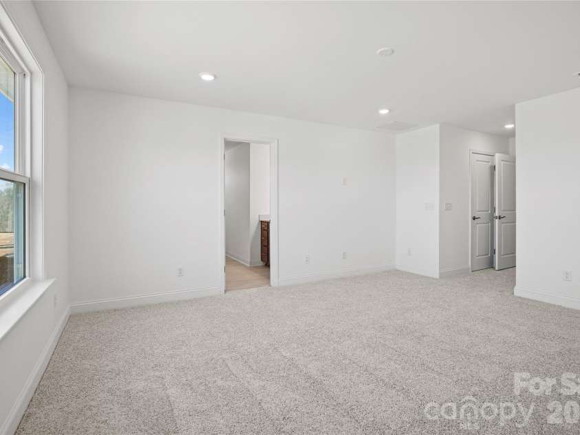 1011 High Bluff Point, Waxhaw, NC 28173.  MLS# CAR4385398, YatesRealty ID 4095. Owner's Suite