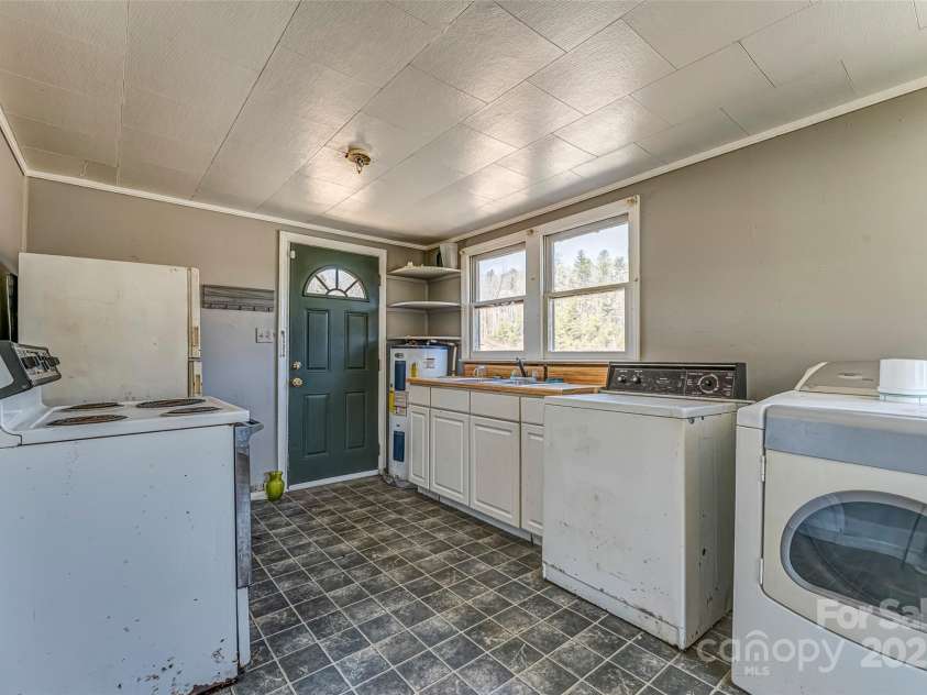 1296 Rosman Highway, Brevard, NC 28712.  MLS# CAR4232852, YatesRealty ID 4095. 