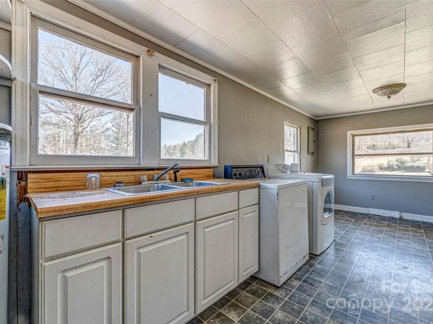 1296 Rosman Highway, Brevard, NC 28712.  MLS# CAR4232852, YatesRealty ID 4095. 