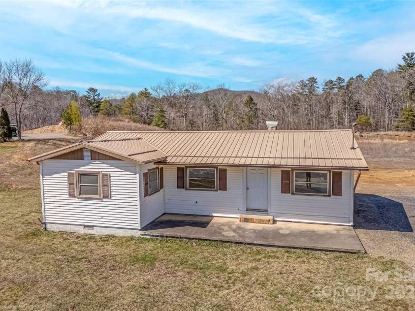 1296 Rosman Highway, Brevard, NC 28712.  MLS# CAR4232852, YatesRealty ID 4095. 