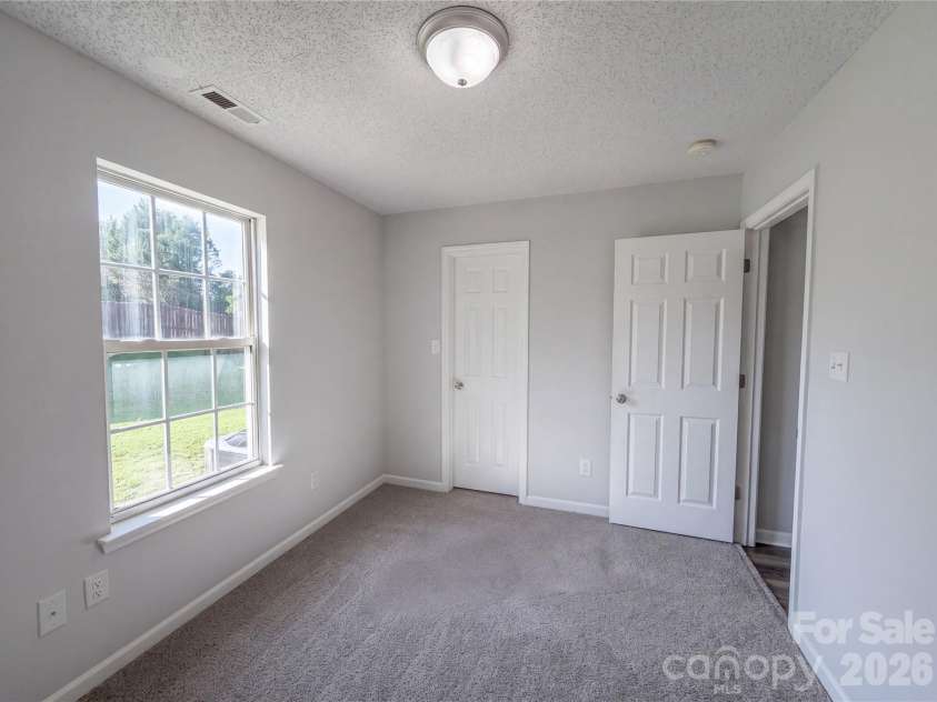 121 Brookstone Drive, Mount Holly, NC 28120.  MLS# CAR4409916, YatesRealty ID 40950. 