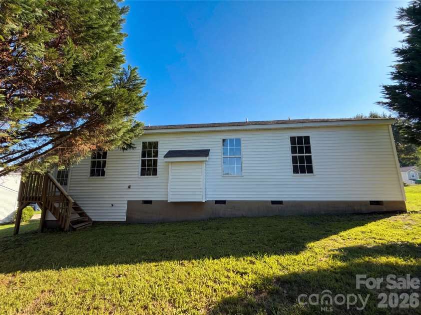121 Brookstone Drive, Mount Holly, NC 28120.  MLS# CAR4409916, YatesRealty ID 40950. 