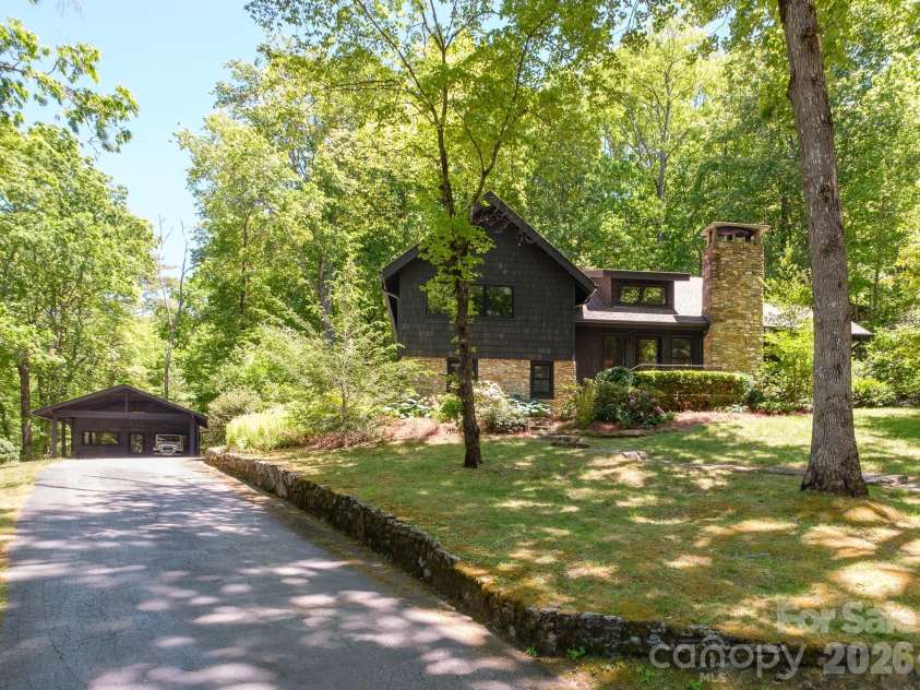 212 Shore Drive, Lake Toxaway, NC 28747.  MLS# CAR4384541, YatesRealty ID 40953. 