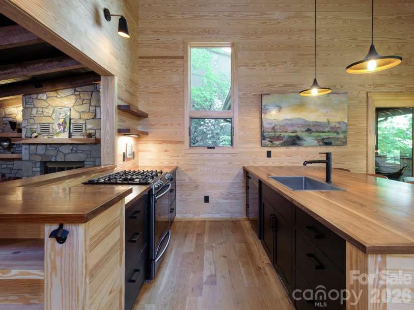 212 Shore Drive, Lake Toxaway, NC 28747.  MLS# CAR4384541, YatesRealty ID 40953. 