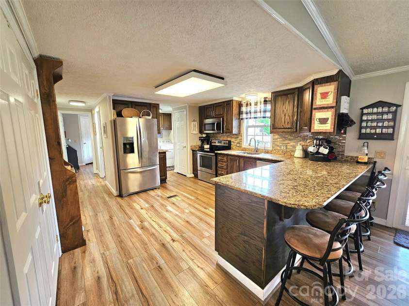 734 Pinehaven Drive, New London, NC 28127.  MLS# CAR4403775, YatesRealty ID 40955. 