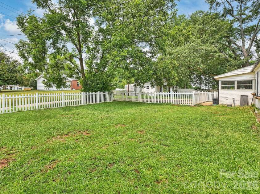 301 Harris Street, Fort Mill, SC 29715.  MLS# CAR4406271, YatesRealty ID 40959. Backyard