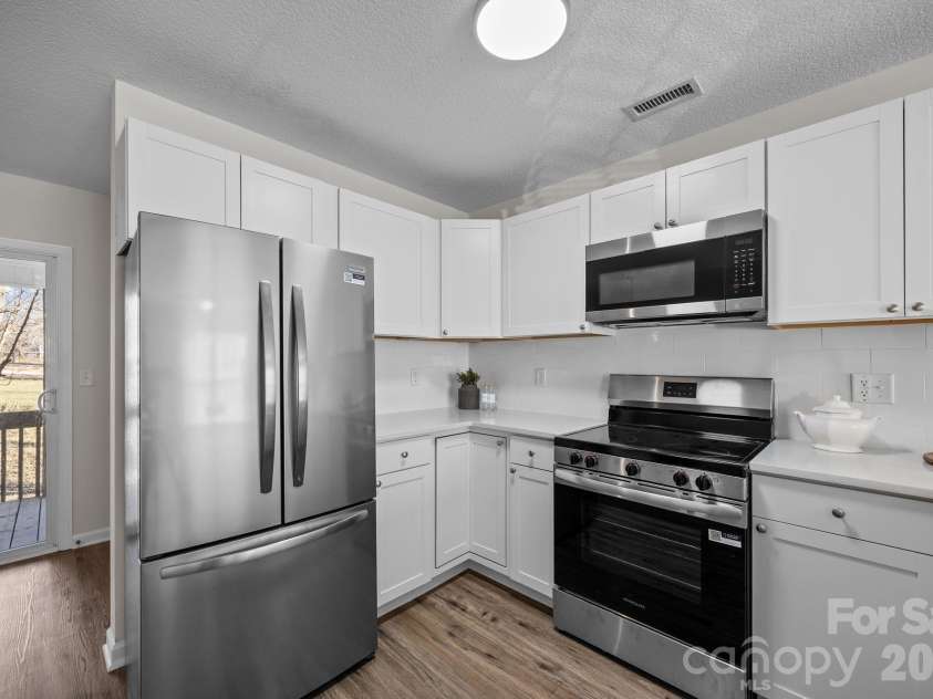 2 Meadow Glen Drive, Fletcher, NC 28732.  MLS# CAR4410204, YatesRealty ID 40961. 