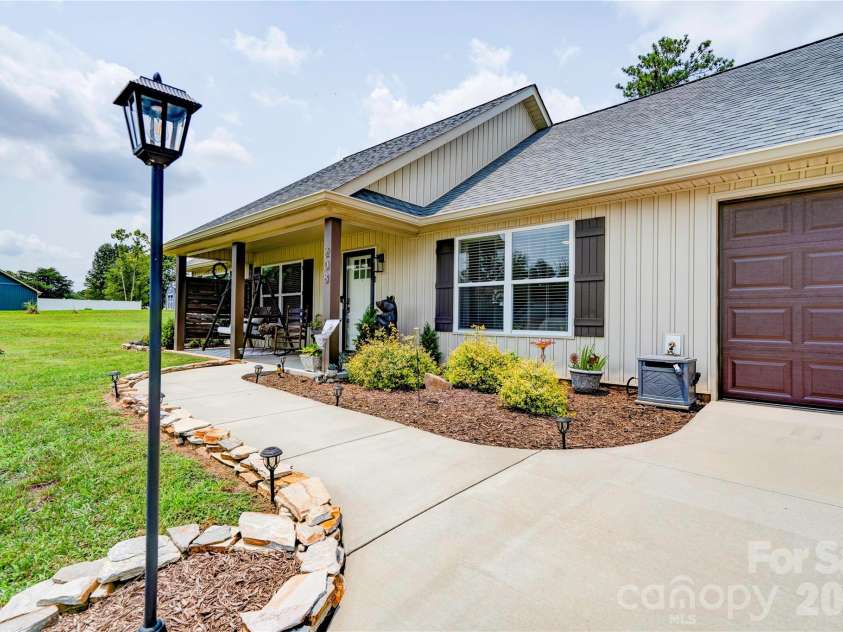 208 Enid Street, Lawndale, NC 28090.  MLS# CAR4408703, YatesRealty ID 40963. Front Walk