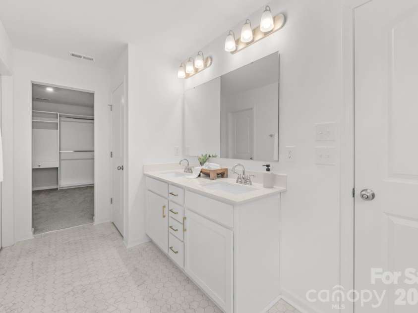 227 Redondo Drive, Wingate, NC 28174.  MLS# CAR4399815, YatesRealty ID 40966. Primary bathroom
