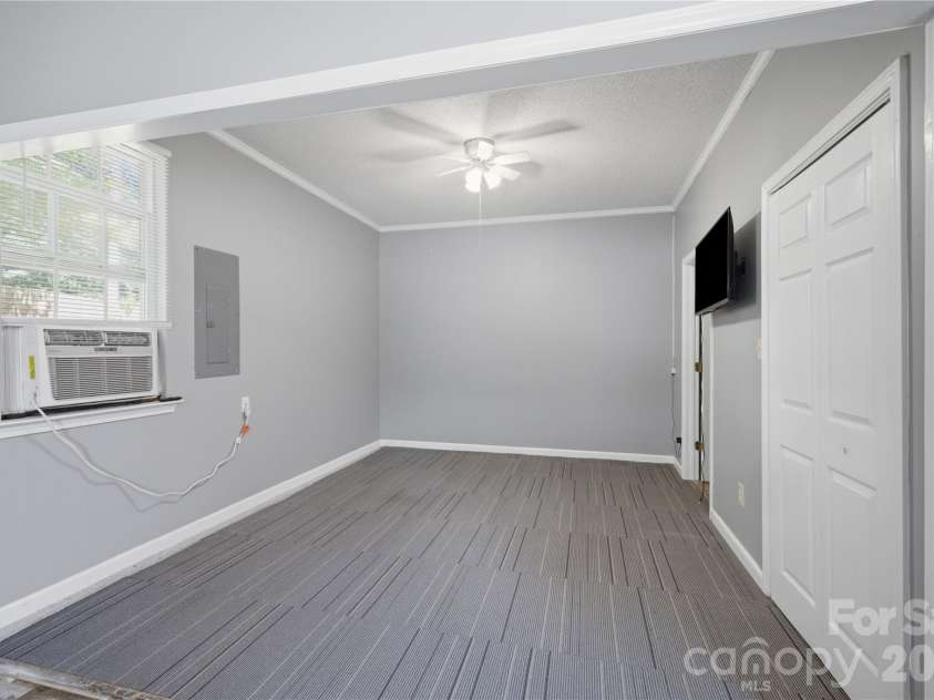 147 Valley Glen Drive, Troutman, NC 28166.  MLS# CAR4400282, YatesRealty ID 40969. Converted garage space